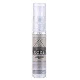 Heldere sprayfles met grijs etiket en CODE branding voor Parfum Musc Code